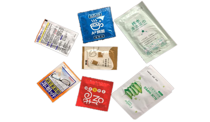 contoh mesin pembungkusan tisu basah