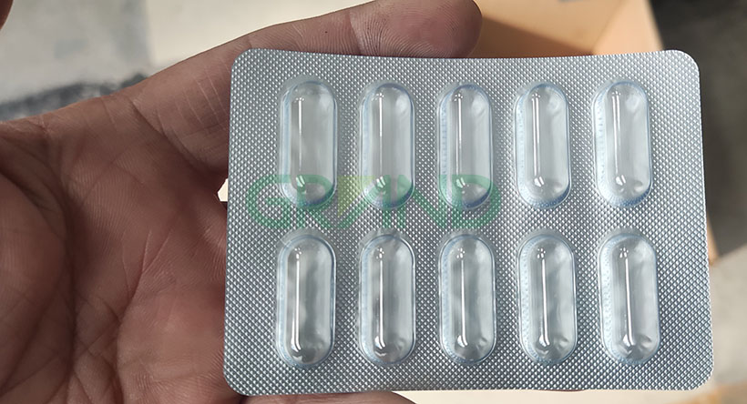 mesin pembungkusan lepuh untuk kapsul